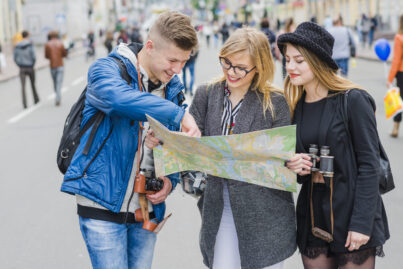 three-friends-with-map-street